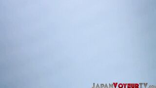 Cute Japanese playing with her pussy while filmed by voyeur