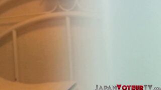 Cute Japanese playing with her pussy while filmed by voyeur