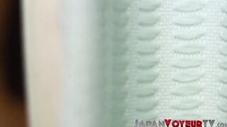Cute Japanese playing with her pussy while filmed by voyeur