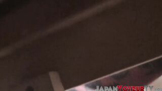 Japanese vixen toys with herself while taped by voyeur