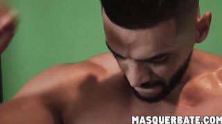 Alluring gay stud shows his muscles and strokes his dick