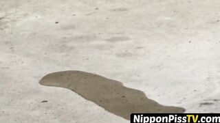Teen Asian redhead shot while peeing in the city