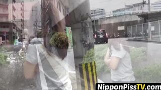 Teen Asian redhead shot while peeing in the city
