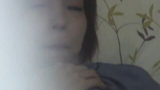 Japanese student teases her cunt through her panties