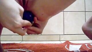 stuffing a big marble egg up my ass