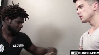 An intruder is apprehended by a security guard who brutally beats him