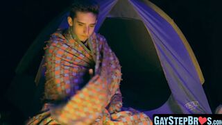 Lively stepbrother beat crude before a setting up camp fire