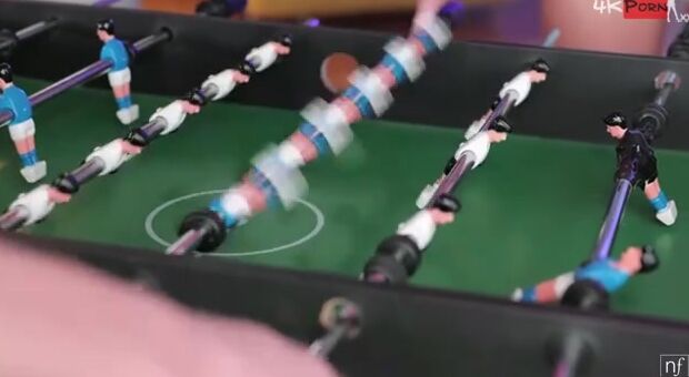 Mia Trejsi and her BF Charlie Dean are having fun at Christmastime. They play foosball together, with Mia celebrating every point she scores by bouncing up and down with her boobies clearly jiggling. After she wins, she comes over to sooth Charlie's p