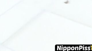 Japanese angel with bushy pussy pissing hard