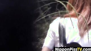 Japanese youngsters having a great time peeing out in the open