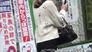 Cute Japanese chicks secretly recorded peeing in a toilet