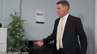 A man with a big dick fucks a red-haired boss in the pussy