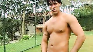 Horny Brazilian jock jerking off his throbbing cock outdoors