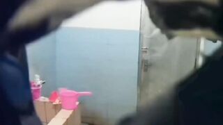 Asian aunt spied in bathroom (big tits)