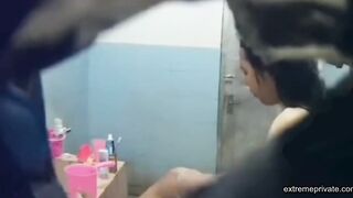 Asian aunt spied in bathroom (big tits)