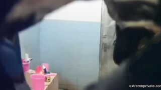 Asian aunt spied in bathroom (big tits)