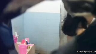 Asian aunt spied in bathroom (big tits)