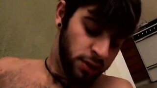 Handsome hairy stud receives passionate handjob and blowjob