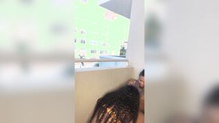 Big Tits Ebony Sucks BBC in a Public Balcony