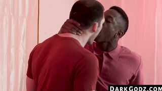 The young man bares his ass in a bareback manner taking the black cock deep
