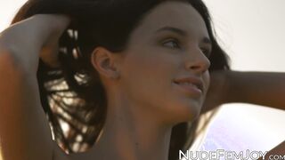 Nubile Sasha C strips and shows natural tits and pussy outdoor