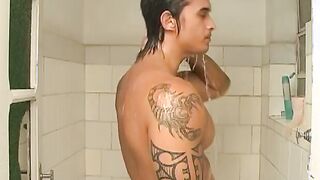 Muscular and hot Brazilian stallion masturbates after shower