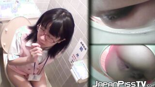 Young Japanese sluts pissing in public toilet with spy cam