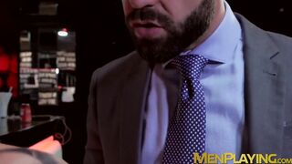 Businessmen with muscles banging after work hours
