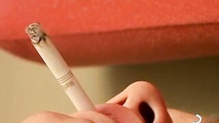 Bryce Corbin pleasing his rock hard cock with lit cig