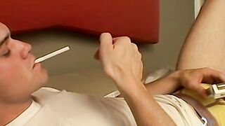 Bryce Corbin pleasing his rock hard cock with lit cig