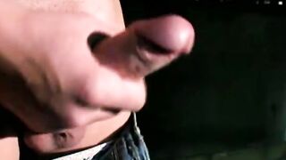 Good looking young man strokes his dick on the balcony solo