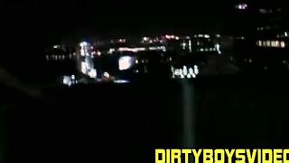 Good looking young man strokes his dick on the balcony solo