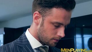 Elevator sex for a pair of businessmen in expensive suits