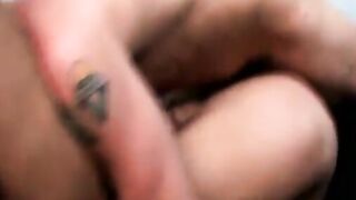 Passionate young gay couple suck each others cock in a car