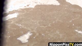 Entrancing Japanese young lady peeing rapidly outside during day