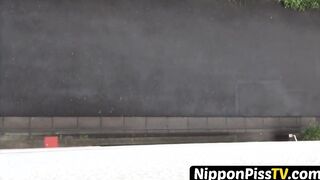 Entrancing Japanese young lady peeing rapidly outside during day