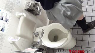 Cutie from Japan fingers her hairy pussy on hidden camera