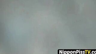 Japanese brunette squats while pissing outside