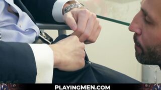 Hunk rimms in a suit and tie comfortingly pounding an irate boss