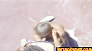A traditional blowjob competition is taking place outside between young men