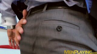 Men in suits enjoy a rough session of steamy sex at work