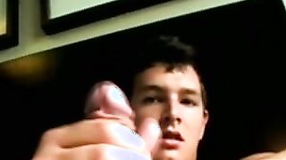 Young amateur stud showers himself and strokes his hard cock