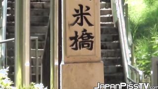 Delectable Japanese peeing outside on beautiful summer day