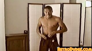A rockhard cock is flexed by a kooky black stallion