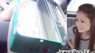 Slutty Japanese chick pisses in the middle of car ride