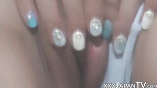 Young Japanese babe licks ice cream and plays with her pussy