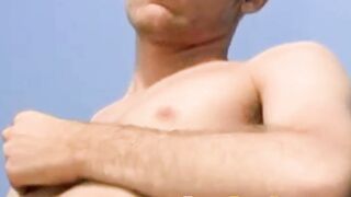 Fit guy Ethan Storm fucks his powerful hand til massive cum explodes
