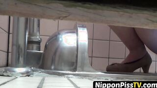 Delightful Asian women close up found peeing on secret cam