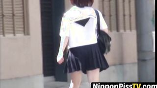 Redhead Japanese with short hair is peeing in the city