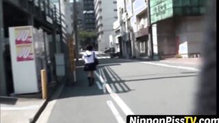 Redhead Japanese with short hair is peeing in the city